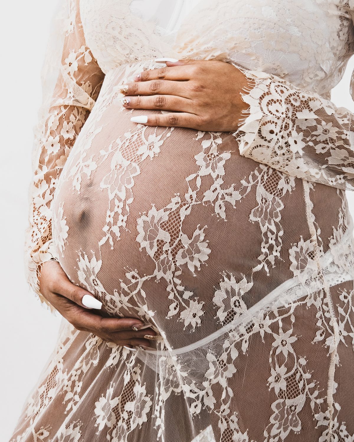 Pregnant woman attending a midwife appointment during the second trimester