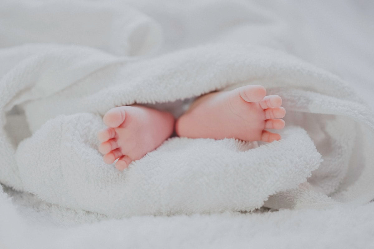 Baby chewing on a teething toy