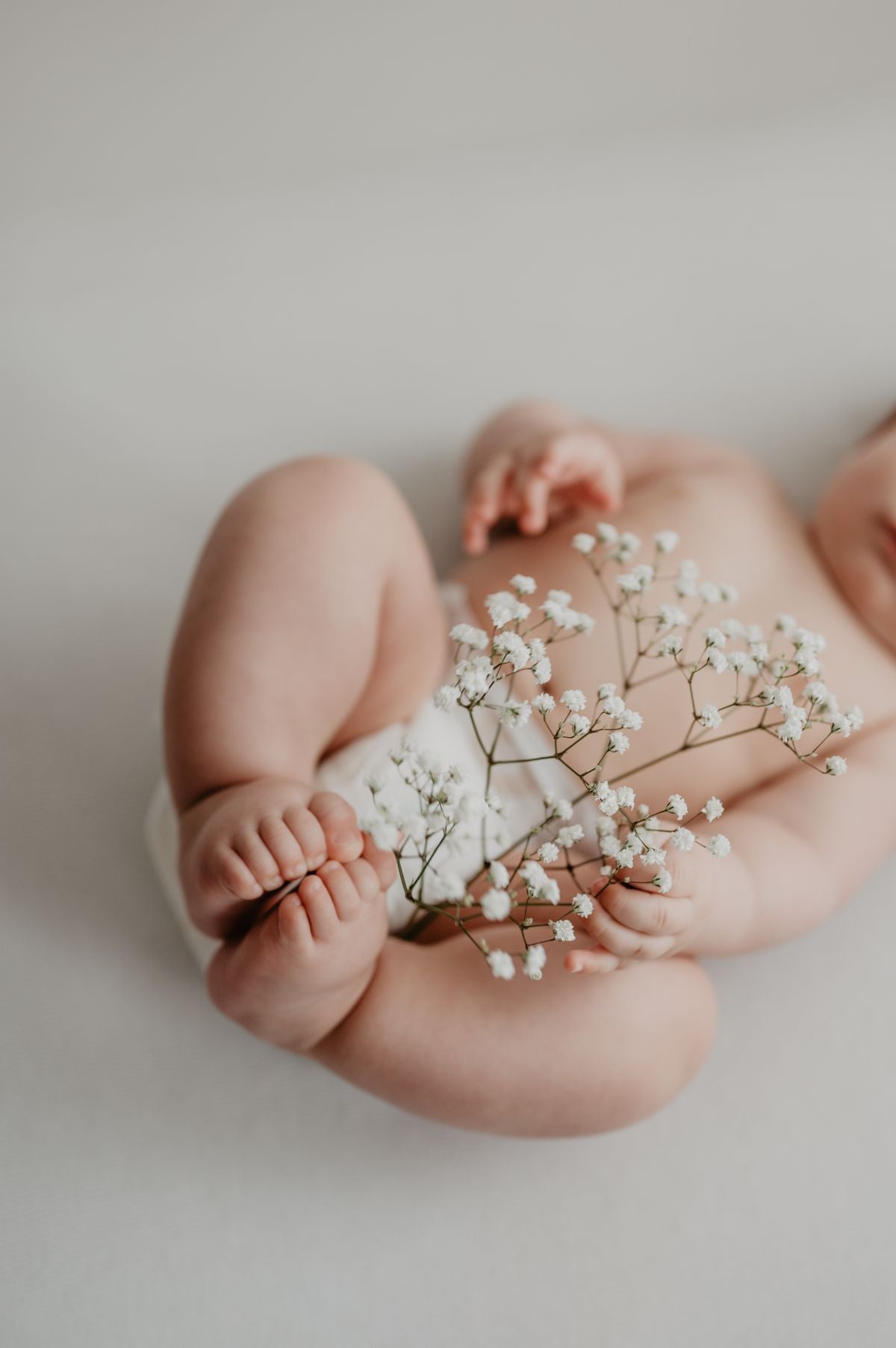 Newborn baby growing and developing
