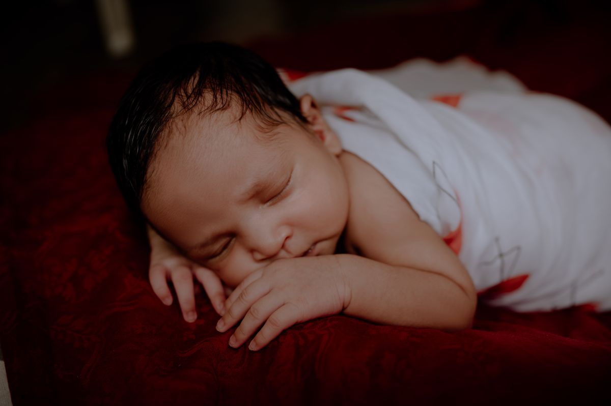 Newborn baby sleeping soundly — white noise for better baby sleep