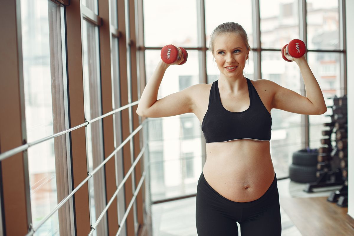 Pregnant woman exercising gently during pregnancy