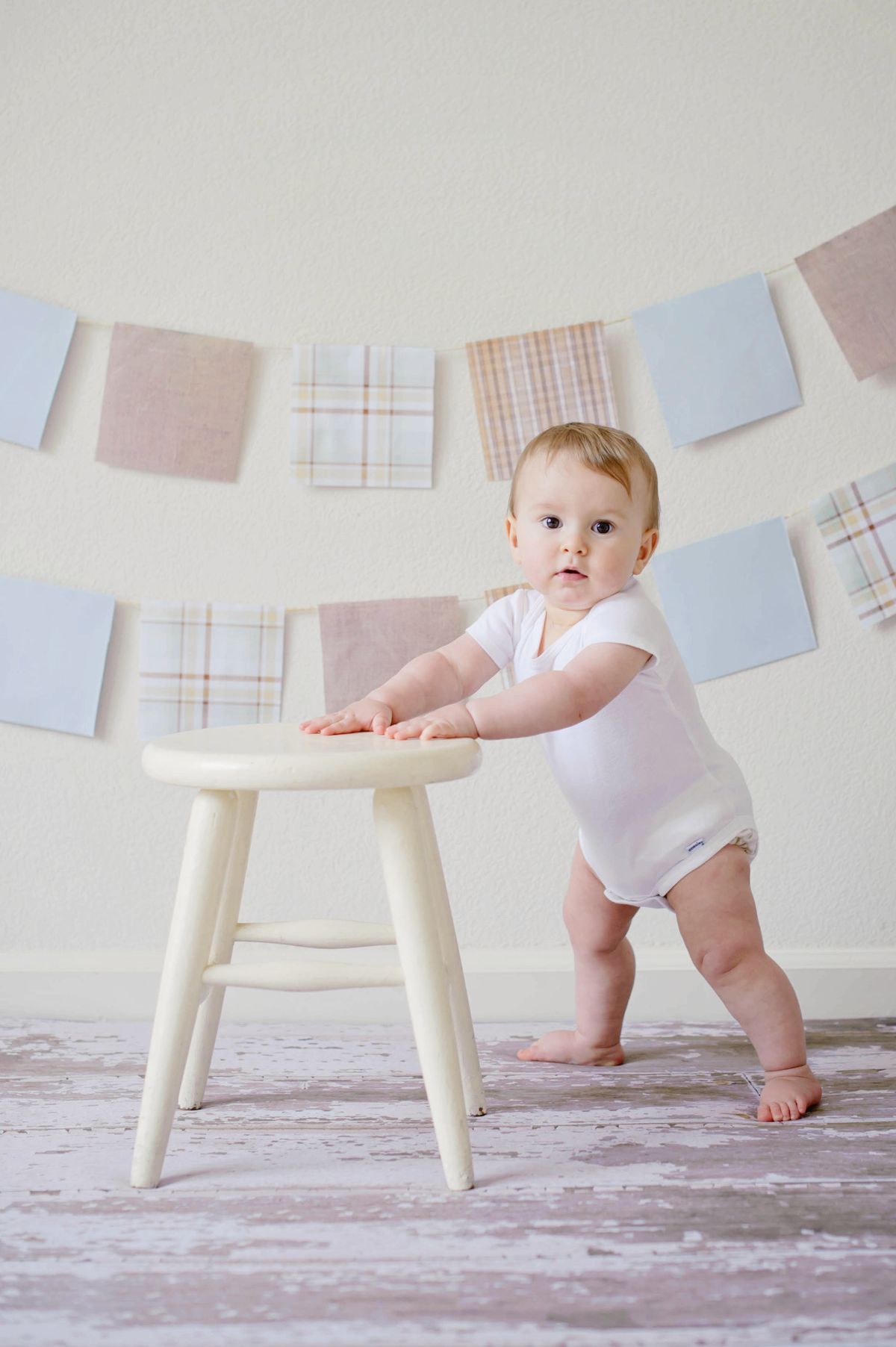 Baby pulling themselves up to stand — developmental milestone guide