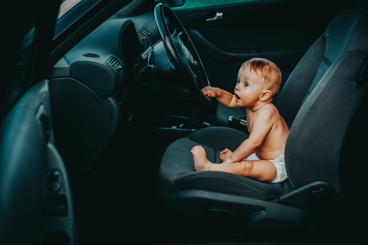 Baby secured in a car seat — car seat safety guide for UK parents