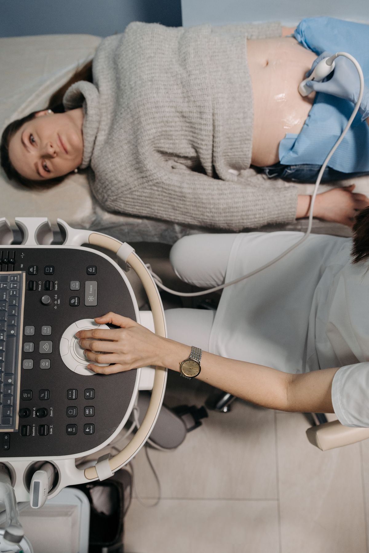 Midwife conducting a late pregnancy check-up appointment