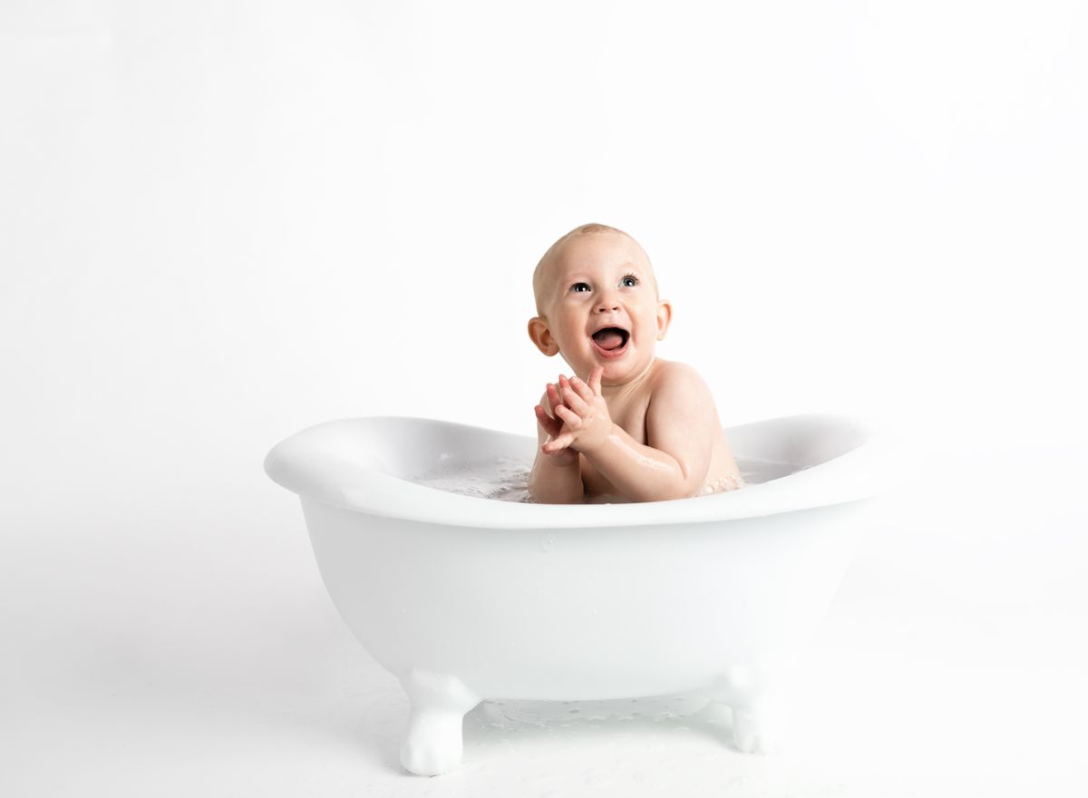 Happy laughing baby milestone development