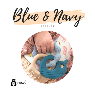 Baby holding the Blue and Navy MultiTexture Sea Teether