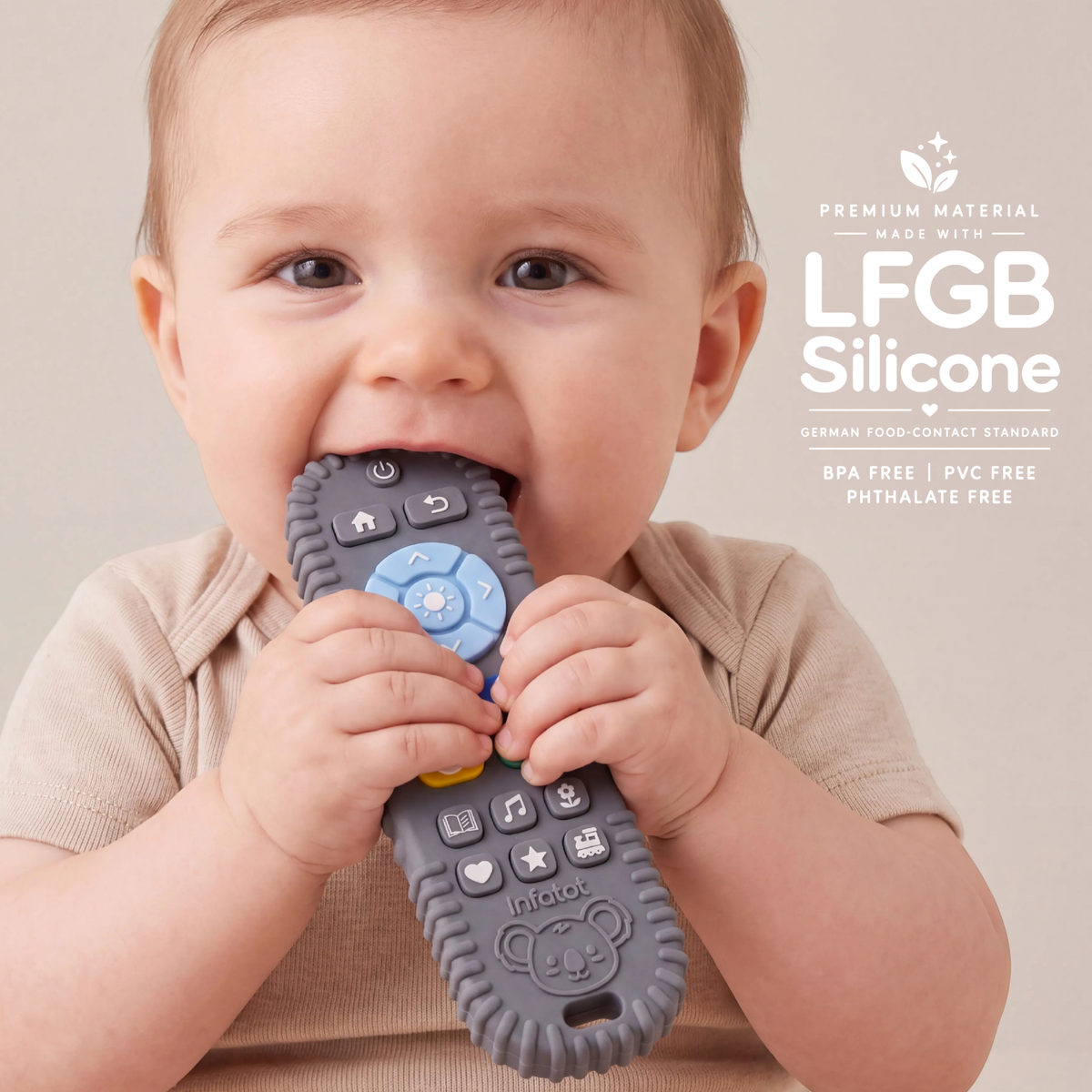 Baby chewing the remote-shaped teether from the Blue Koda Koala pair