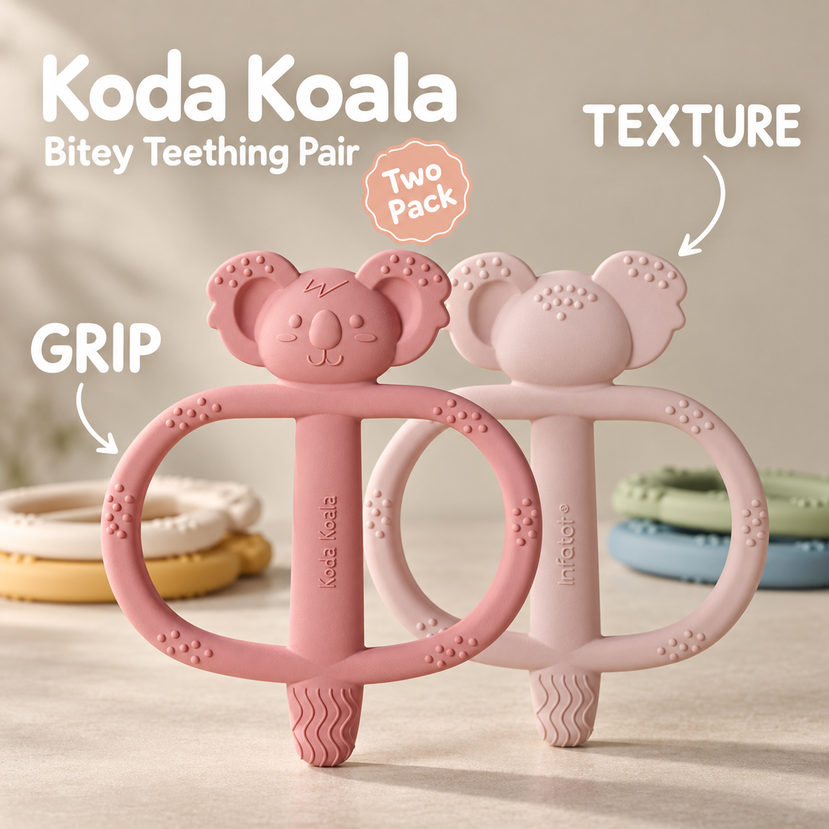 Plum and Pink Koda Koala Bitey teethers with their grip handles and textured koala faces highlighted