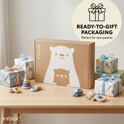 Infatot baby bib gift box displayed among wrapped presents