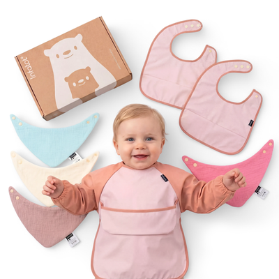 Blush seven-piece bib set with coverall, muslin bibs, feeding bibs and Infatot gift box