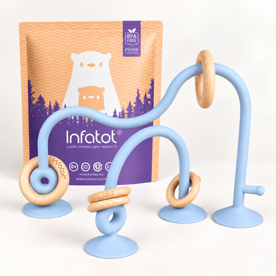 Baby Blue Infatot suction toy with looping arms, wooden rings and packaging