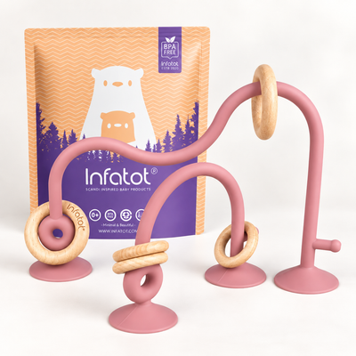 Plum Infatot suction toy with looping arms, wooden rings and packaging